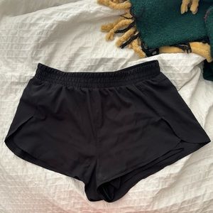 Girlfriend collective trail shorts in black
